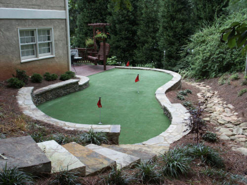 Golf green with retaining walls